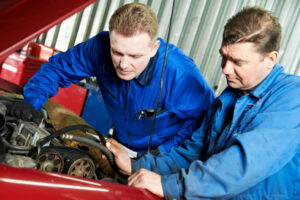 Austin auto mechanics inspecting a car